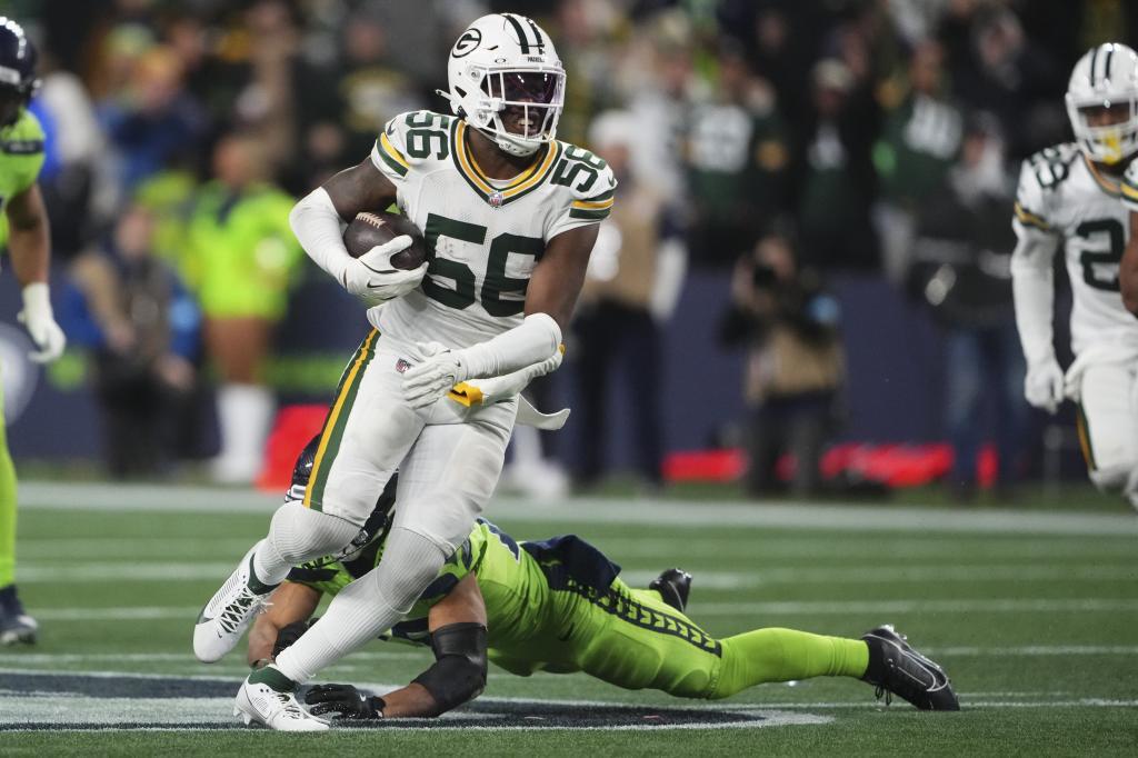 Green Bay Packers' Edgerrin Cooper intercepts a pass during the second half of an NFL football game against the Seattle Seahawks