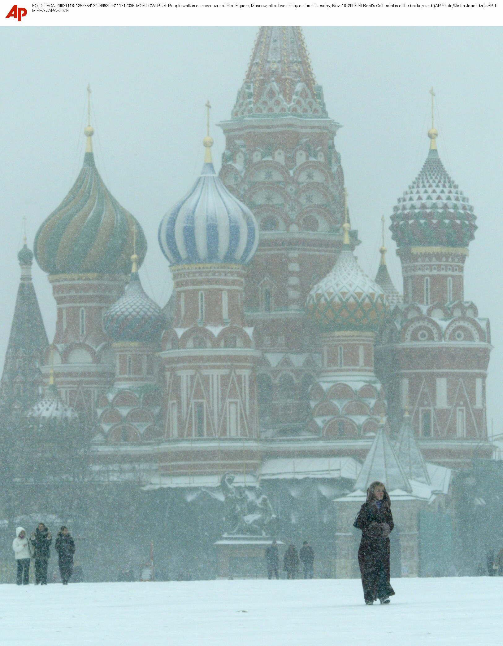 A woman walking in the snow in Moscow.