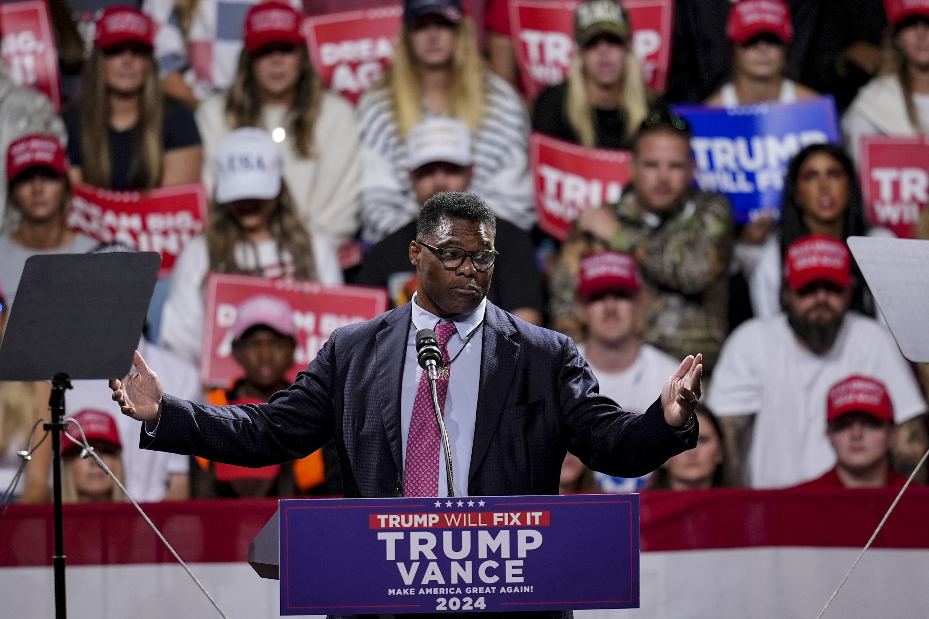 Herschel Walker speaks during a campaign rally.