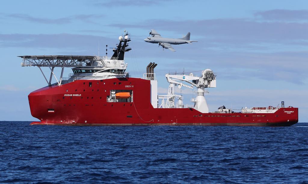 Australian Defence shows a Royal Australian Air Force AP-3C Orion flying past Australian Defence Vessel Ocean Shield on a mission to drop sonar buoys to assist in the acoustic search for the missing Malaysia Airlines flight MH370