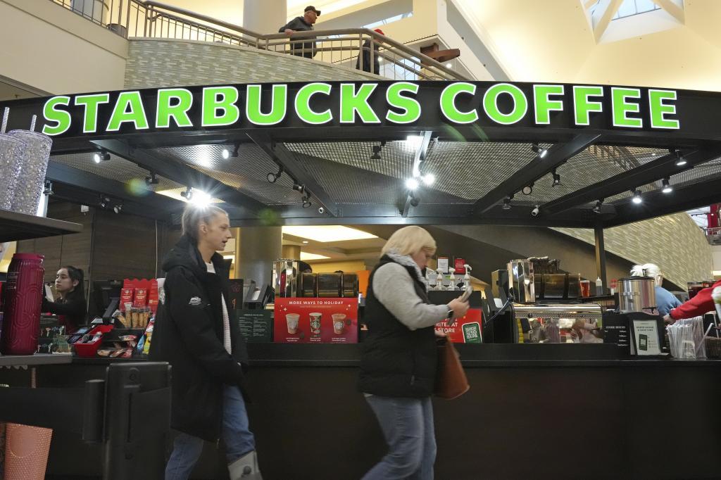 Shoppers at the Walden Galleria in Buffalo, NY, stop by the Starbucks kiosk