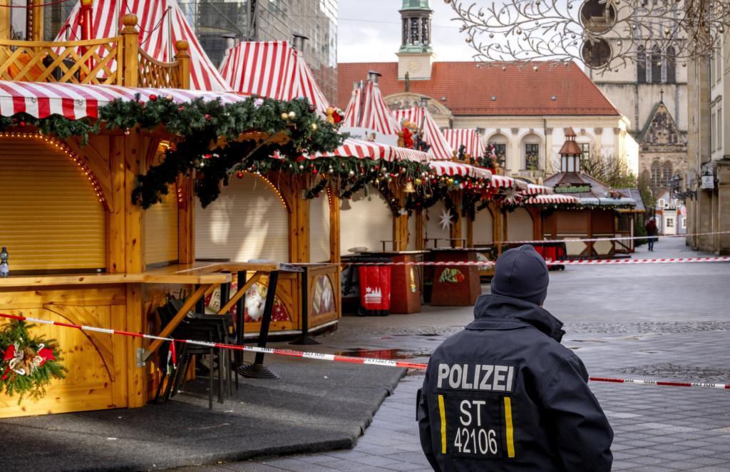 A police officer guards the Christmas Market