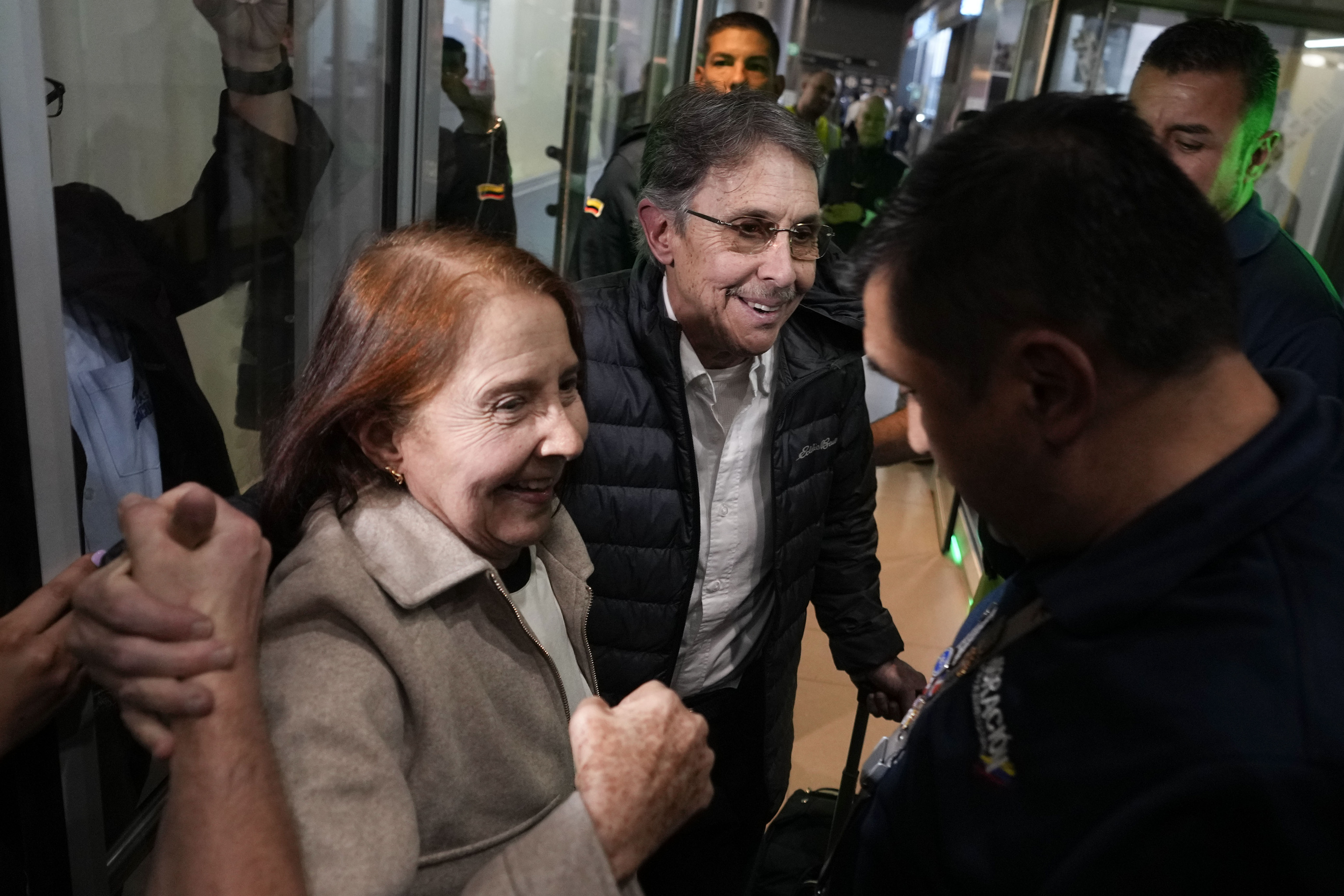 Fabio Ochoa, center, a former member of Cartel of Medellin, is welcomed by relatives.