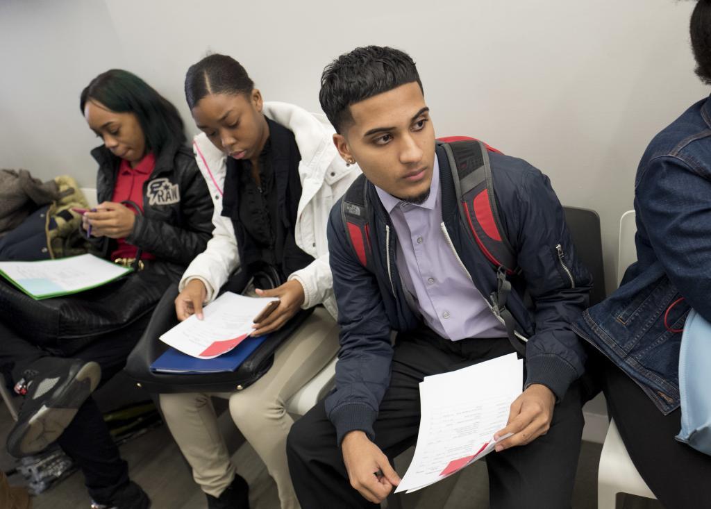 Ammer Gondal waits to see a recruiter during a job fair hosted by the Gregory Jackson Center for Brownsville