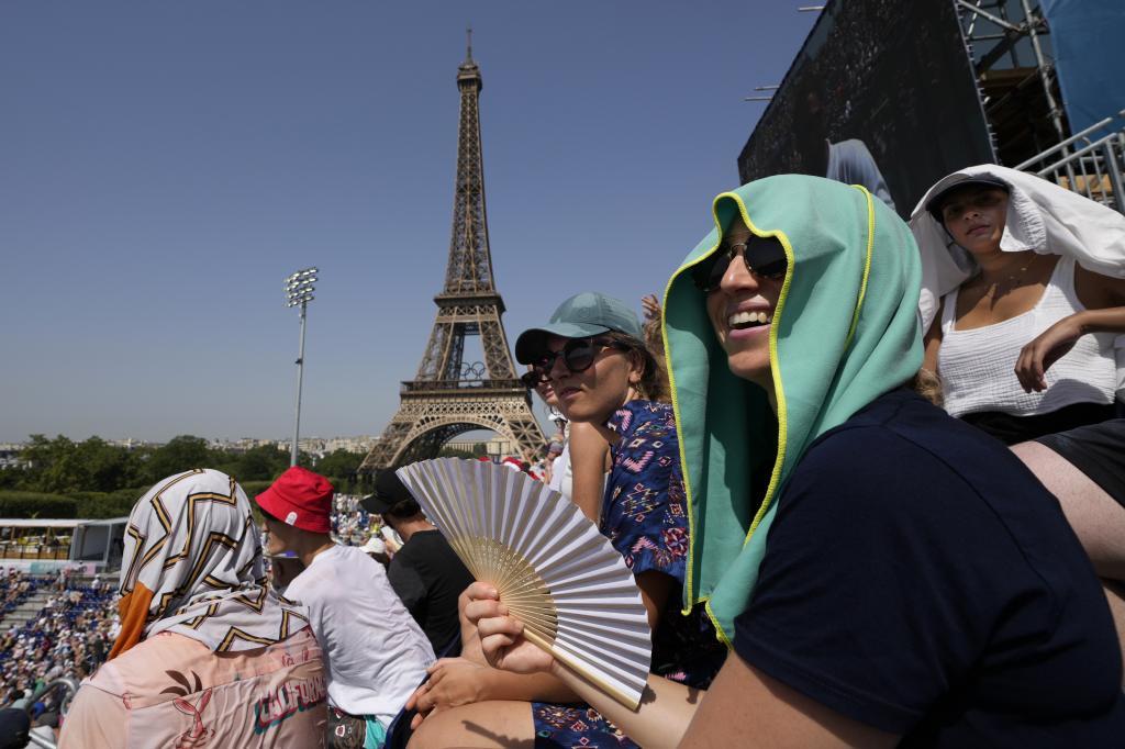 Spectators at a tennis match during the Paris 2024 Olympic Games.