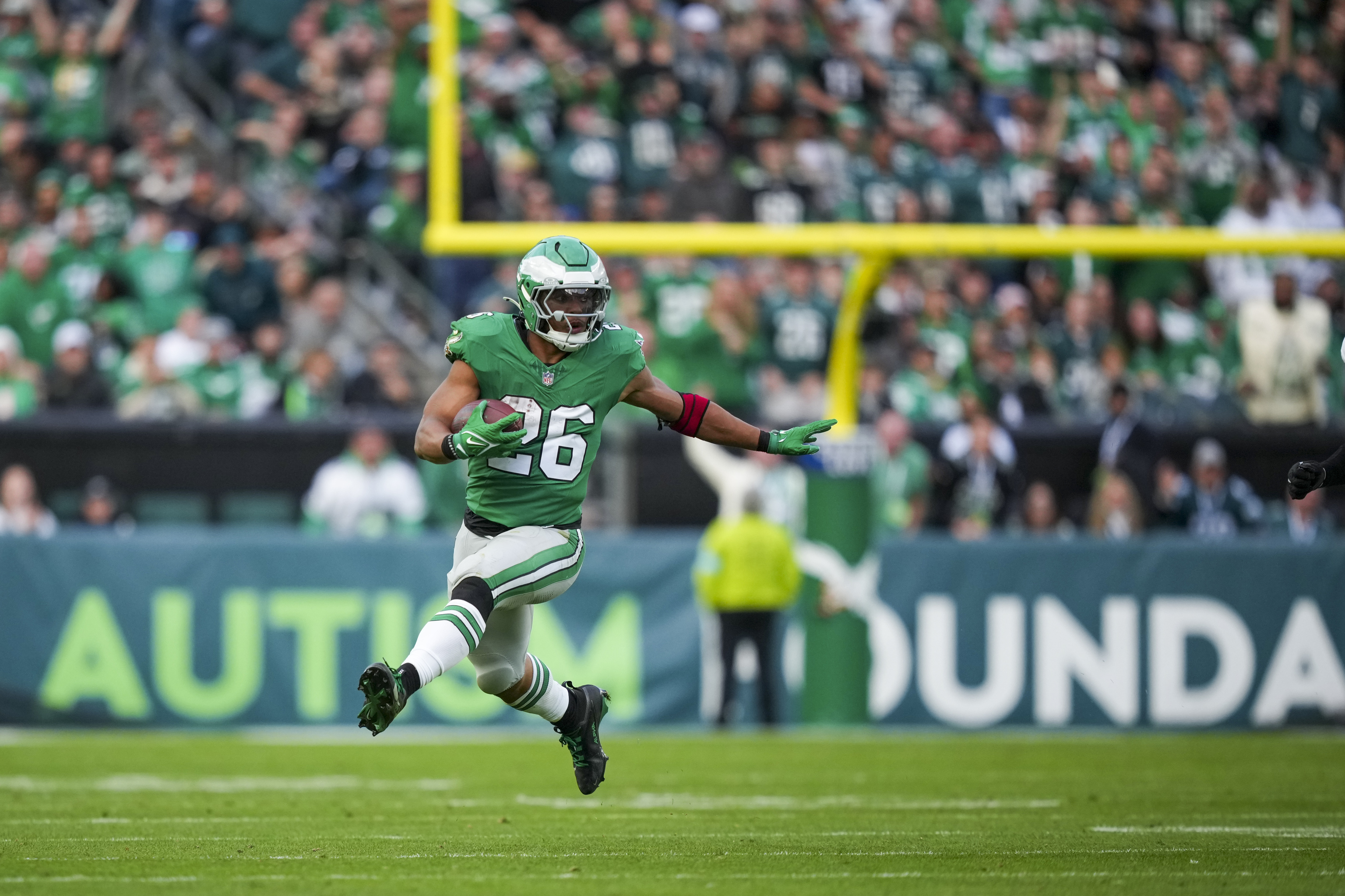 Eagles Running back, Saquon Barkley celebrates a touchdown.