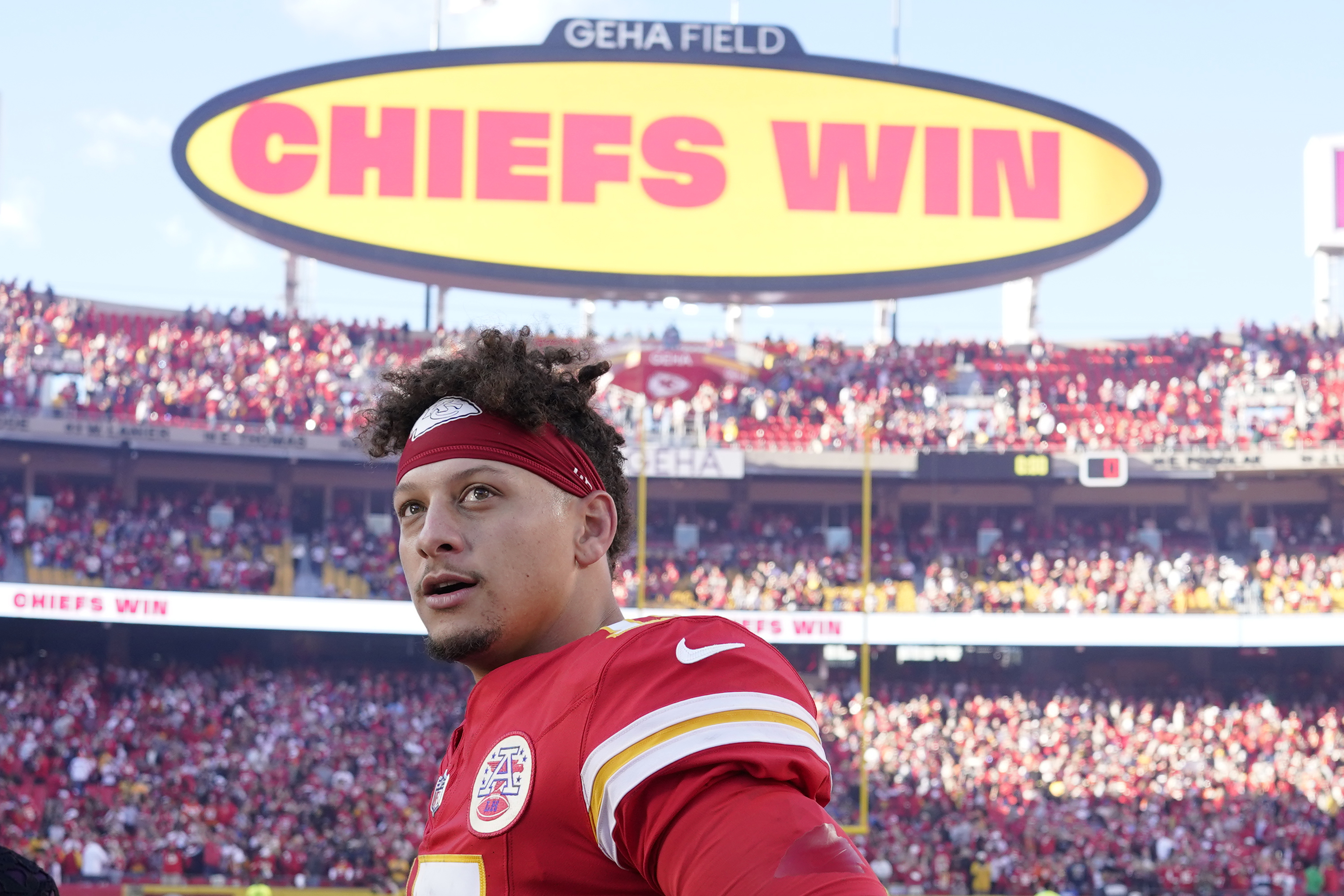 Kansas City Chiefs quarterback Patrick Mahomes pauses following an NFL football game against the Denver Broncos.