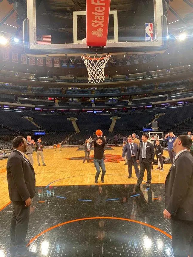 One of the travelers shooting a free throw at Madison Square Garden.