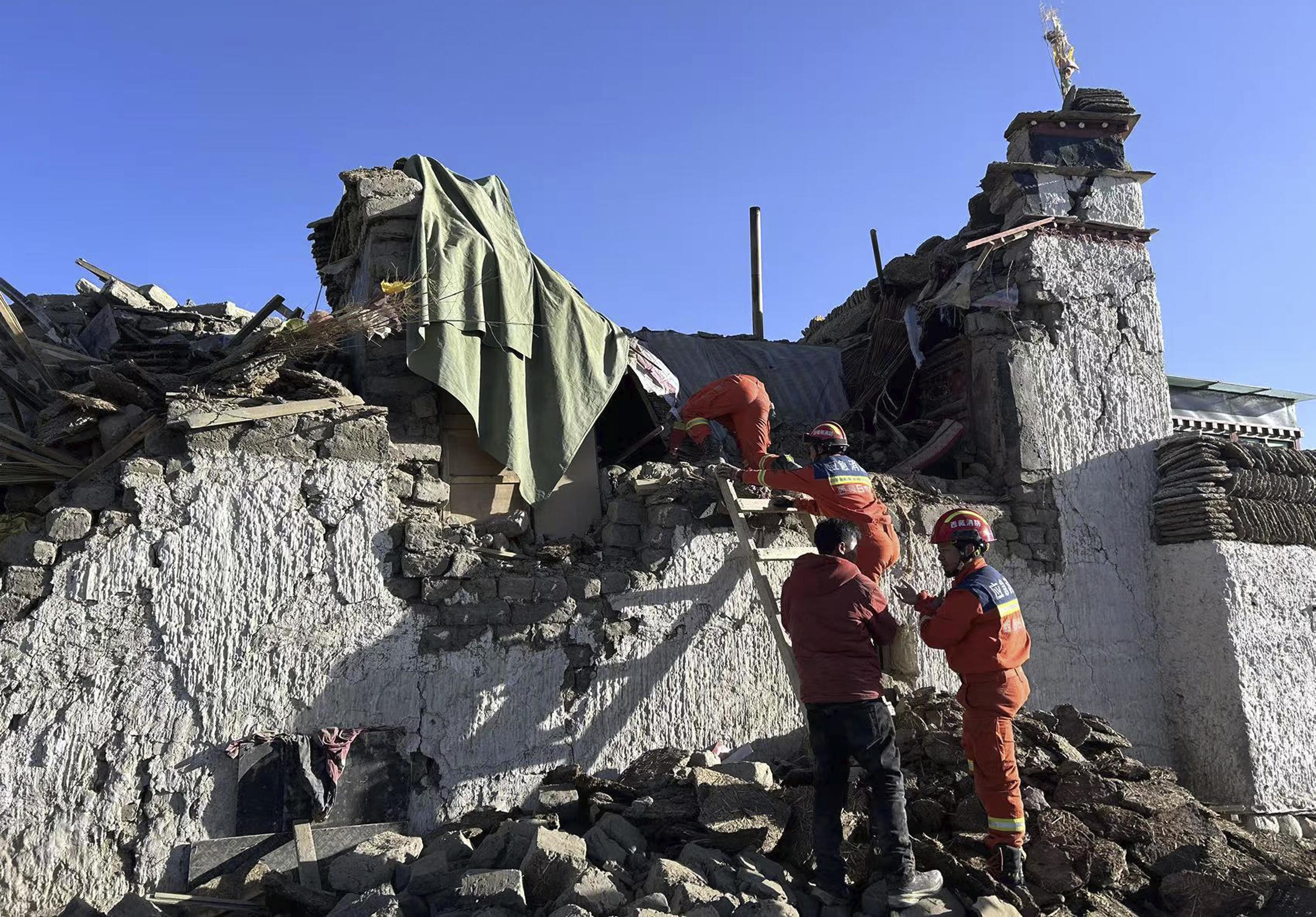 Rescuers search for survivors after an earthquake in Changsuo Township.