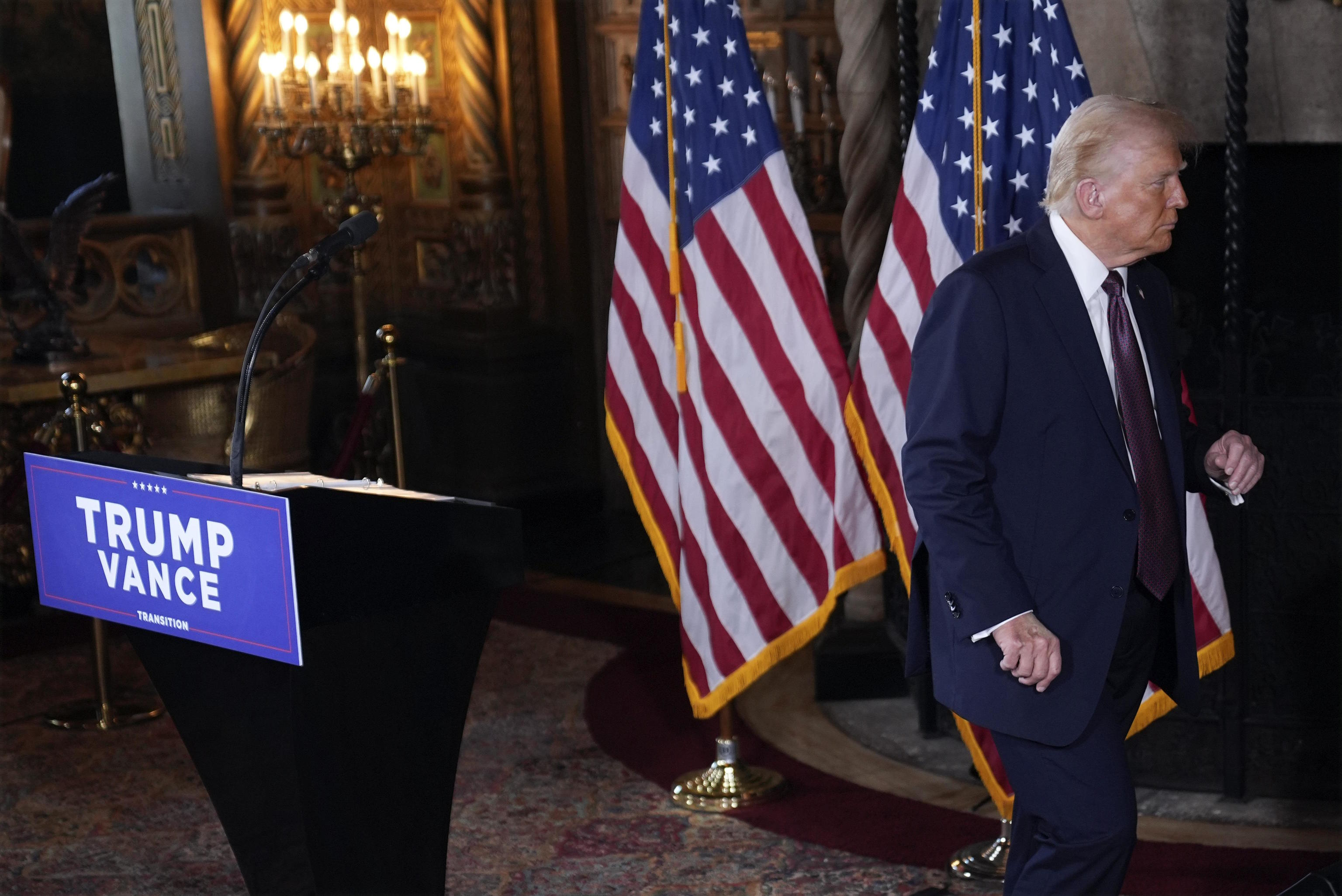 President-elect Donald Trump walks off the podium after a press conference.