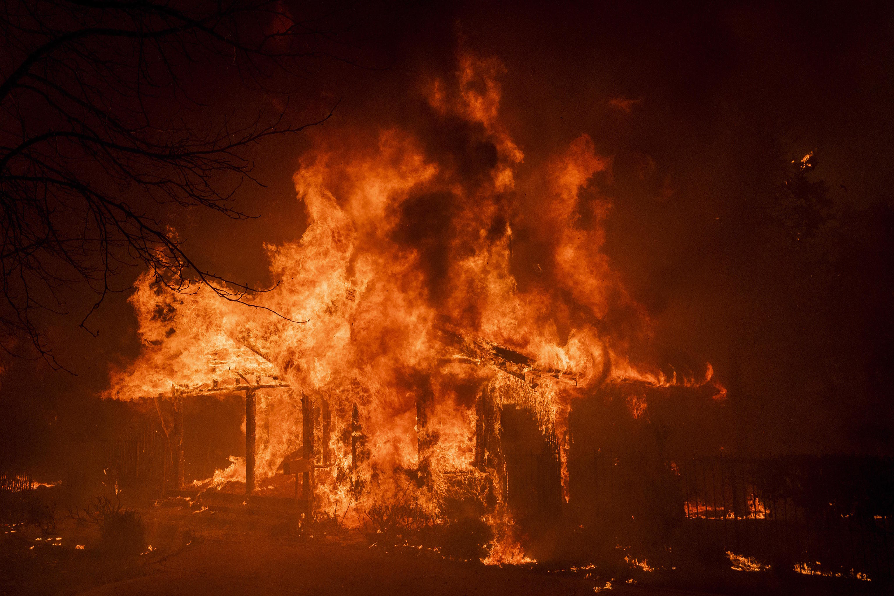 A house burns in the Eaton Fire in Altadena, Calif.