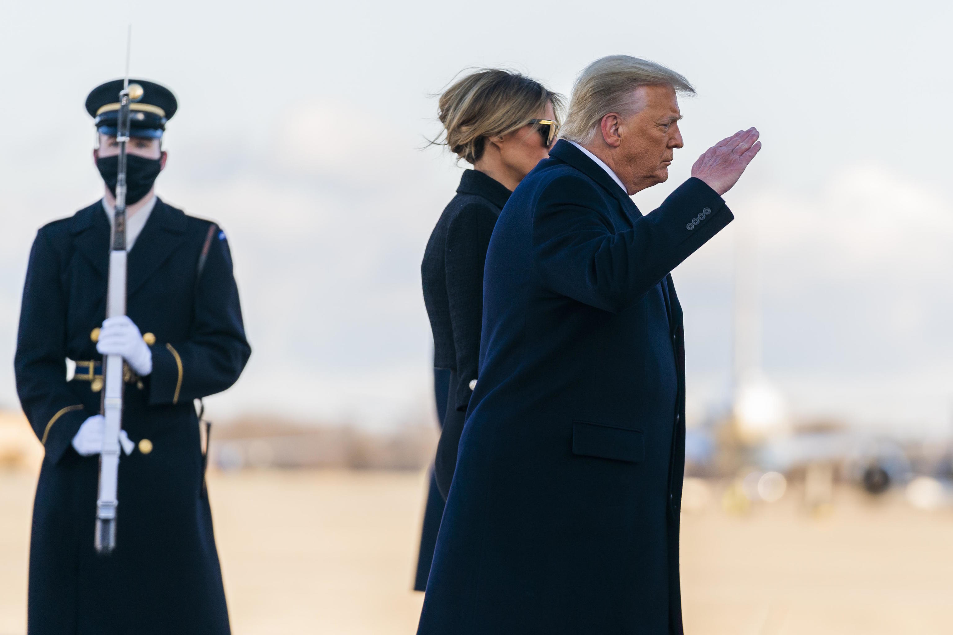 outgoing President Donald Trump and first lady Melania Trump.