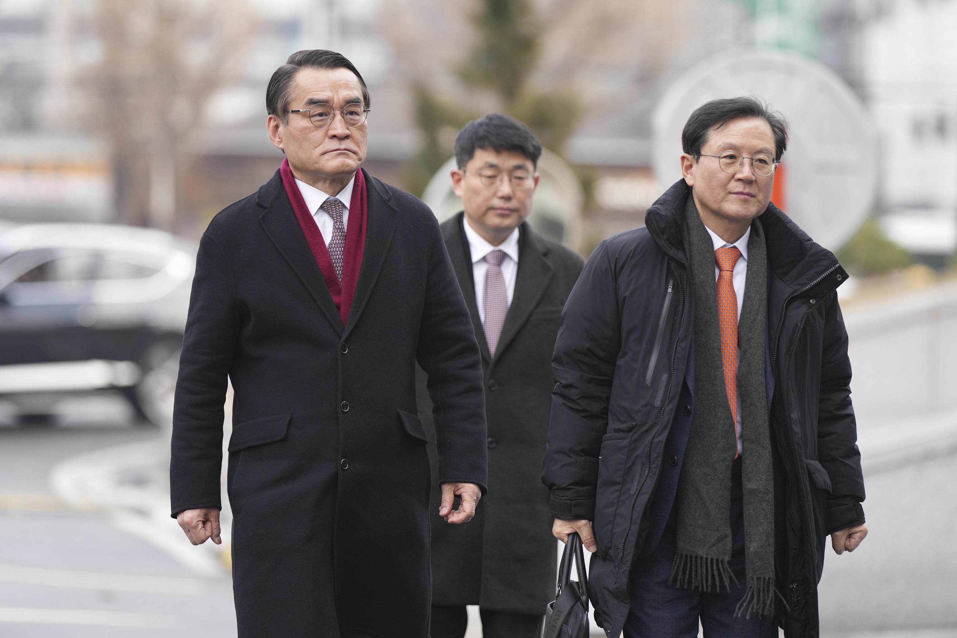 Yoon Kab-keun, right, lawyers for South Korea's impeached President Yoon.