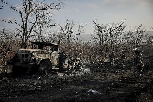 Military personnel in Ukraine collect damaged ammunition in the Donetsk region.