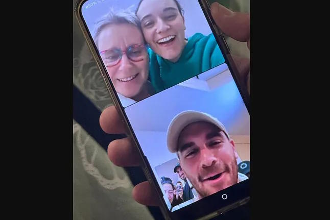 "Emily is home." Emily Damary's mother shared a screenshot of a video call between her and Emily, now together, and her brother.