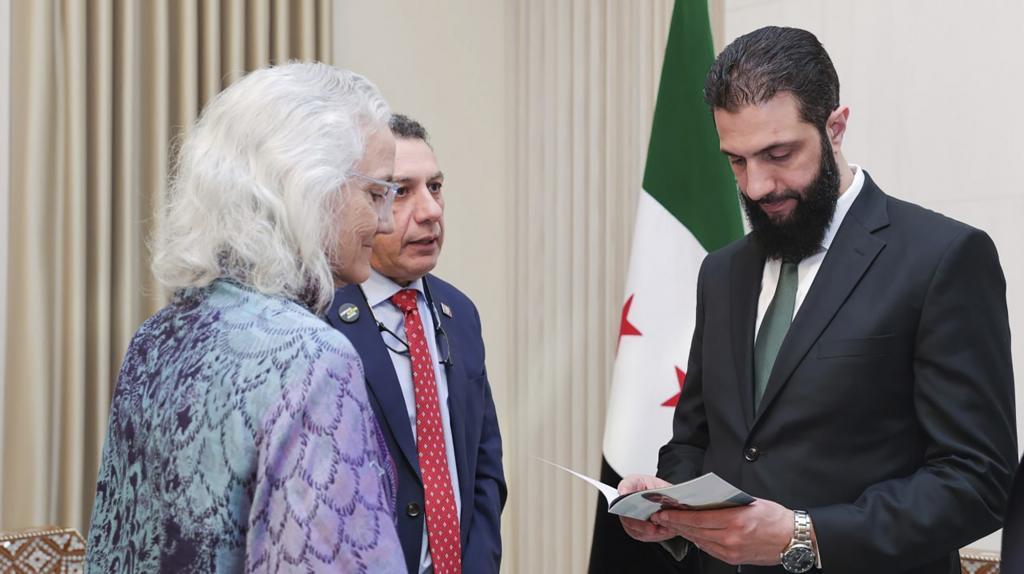 Syria's de facto leader Ahmad al-Sharaa, right, meets with Debra Tice, the mother of American journalist Austin Tice