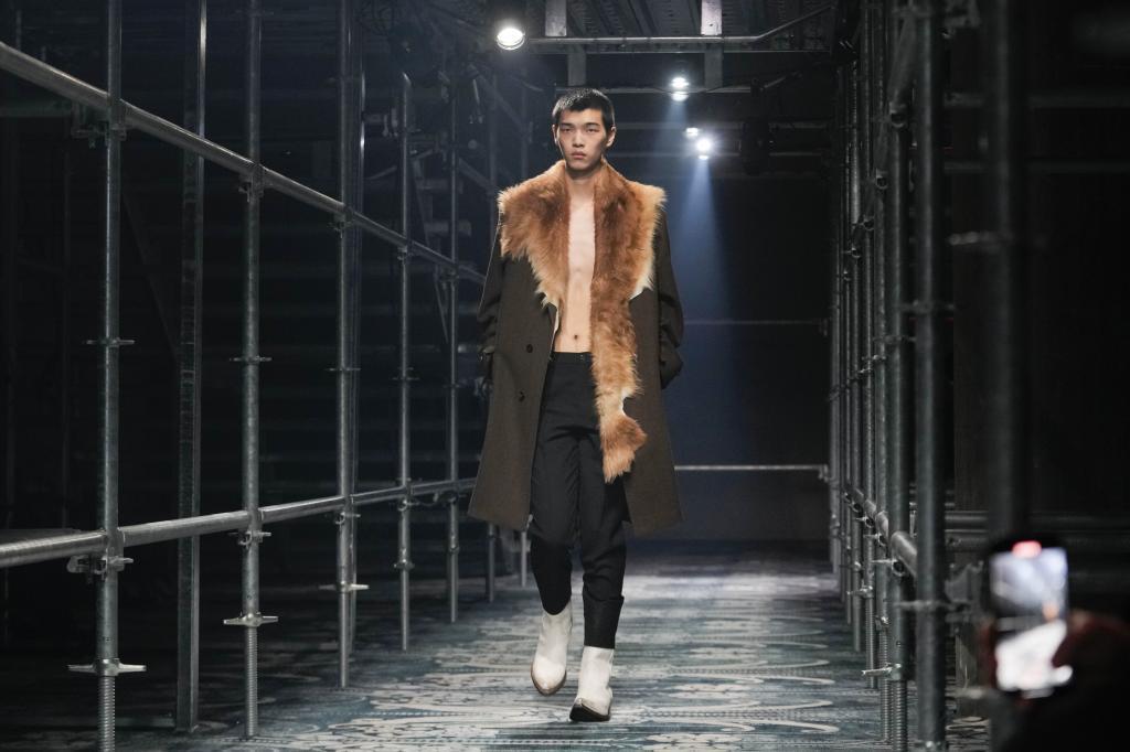 A model wears a creation part of the men's Prada Fall-Winter 2025-2026 collection