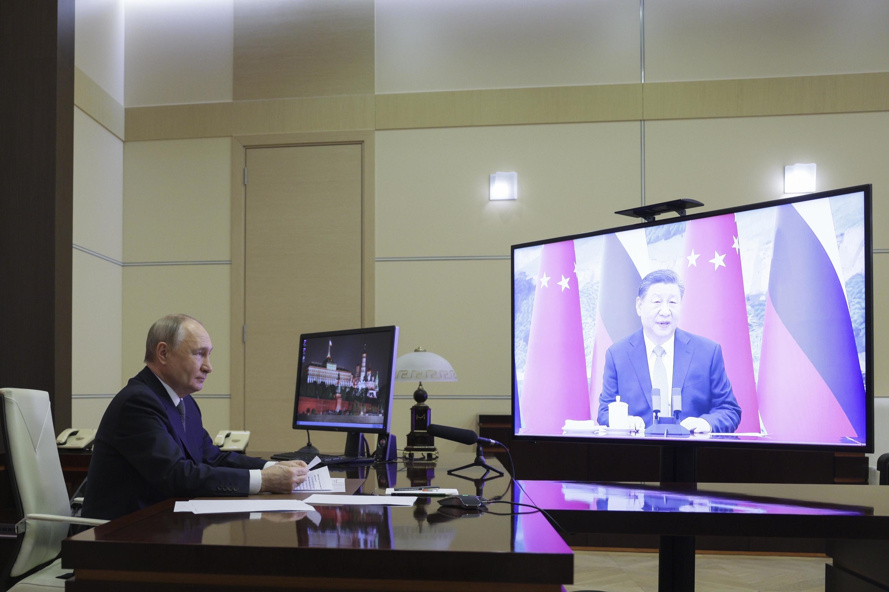 The Russian president in a video call with Xi Jinping.