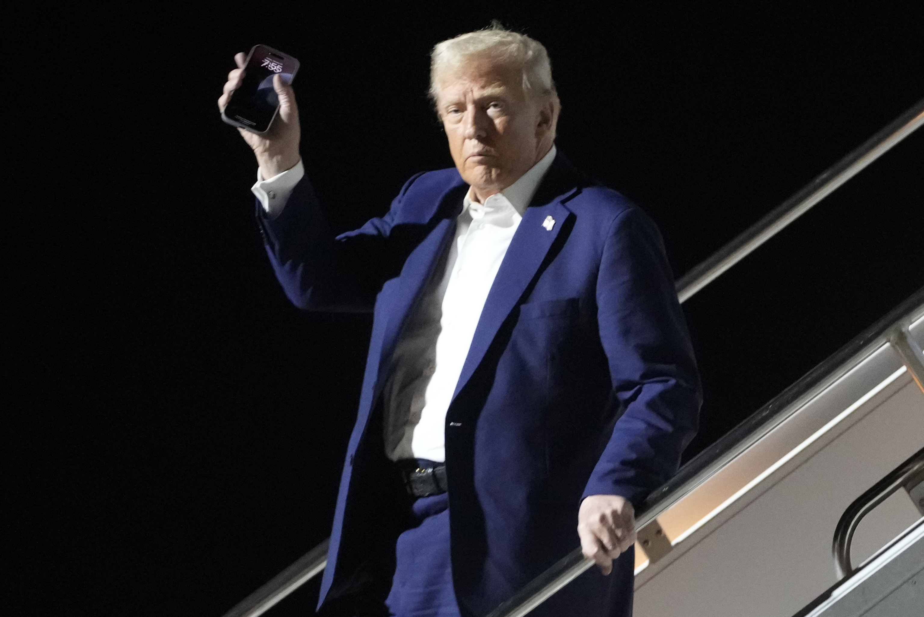 President Donald Trump arrives on Air Force One at Harry Reid International Airport in Las Vegas.