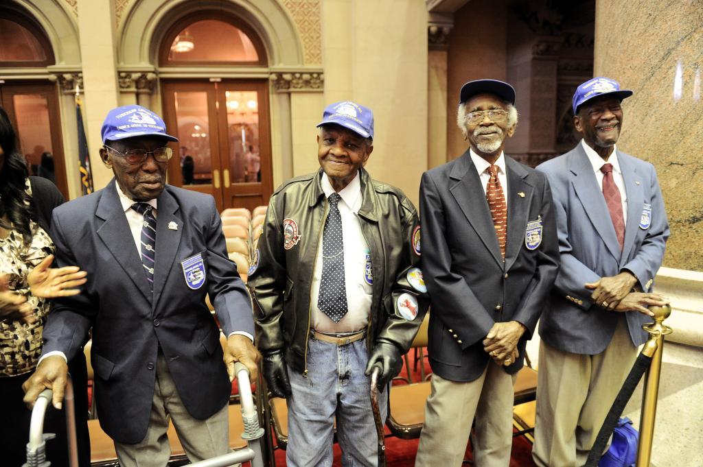 Tuskegee Airmen, from left, Audley Coulthurst of New York, William Johnson of Glen Cove, N.Y., Wilfred R. DeFour of New York, and Herbert C. Thorpe of Rome, N.Y.