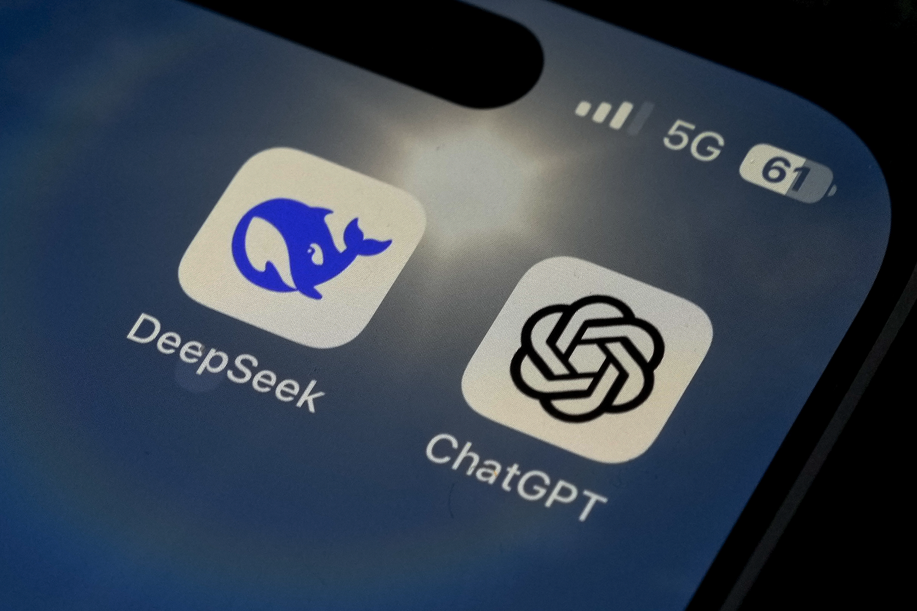 The Icons for the smartphone apps DeepSeek and ChatGPT are seen on a smartphone.