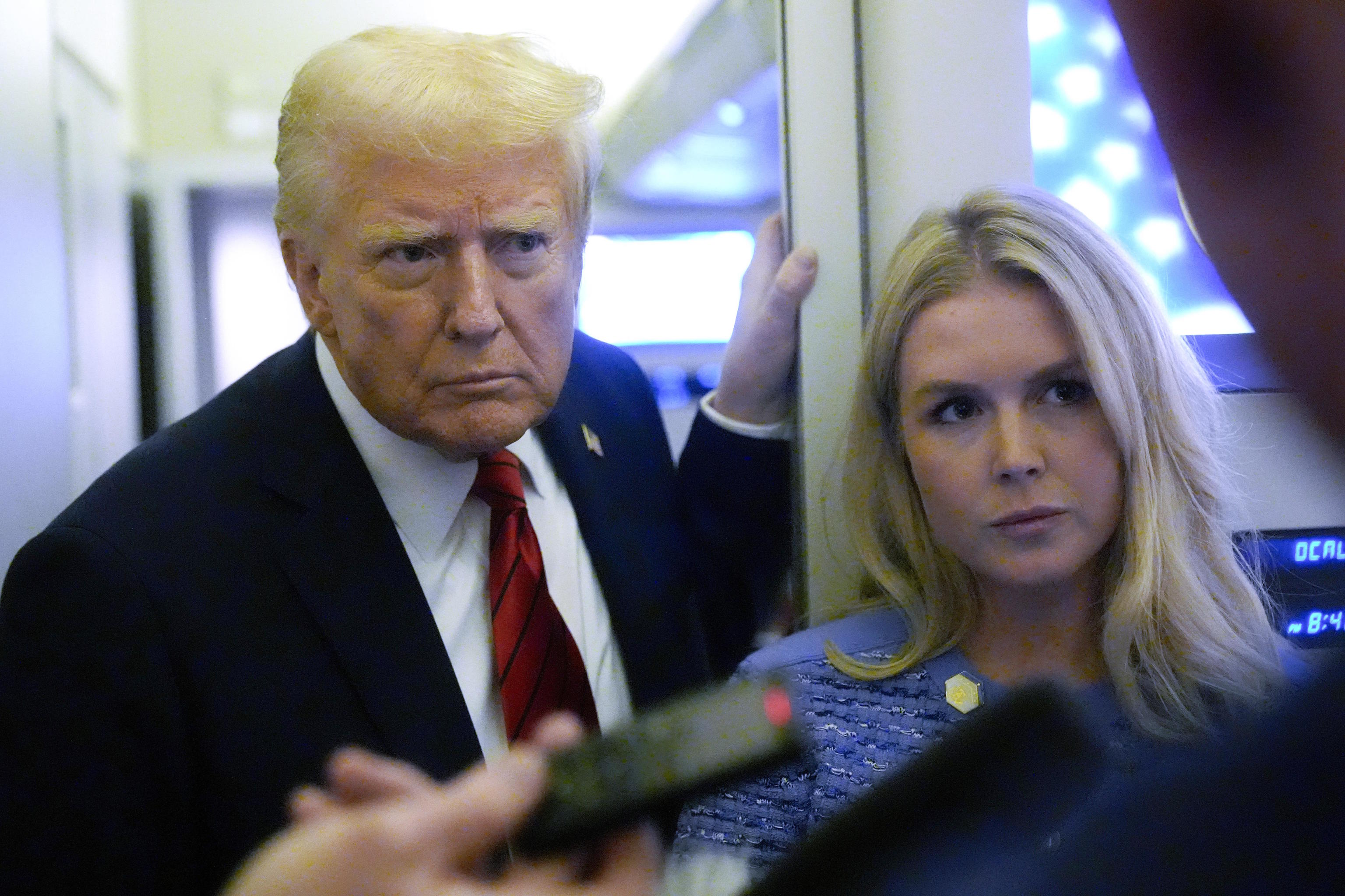 President Trump aboard Air Force One together Karoline Leavitt.