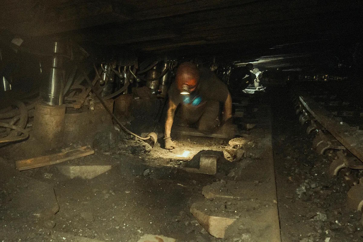 Miners working in a coal mine on the border between Dnipropetrovsk and Donetsk, near the front line.