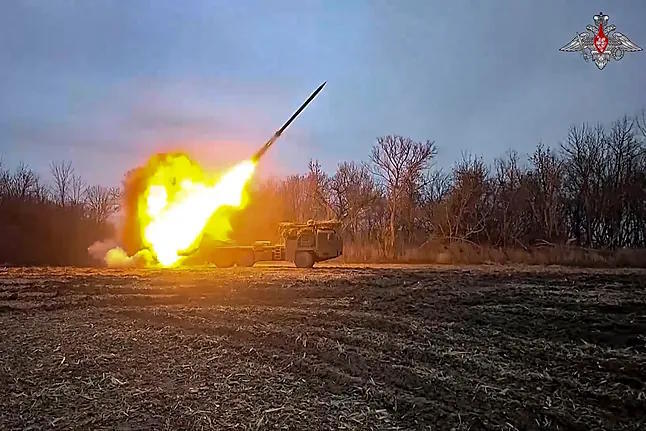 A Russian rocket launcher fires in the border area of the Kursk region.