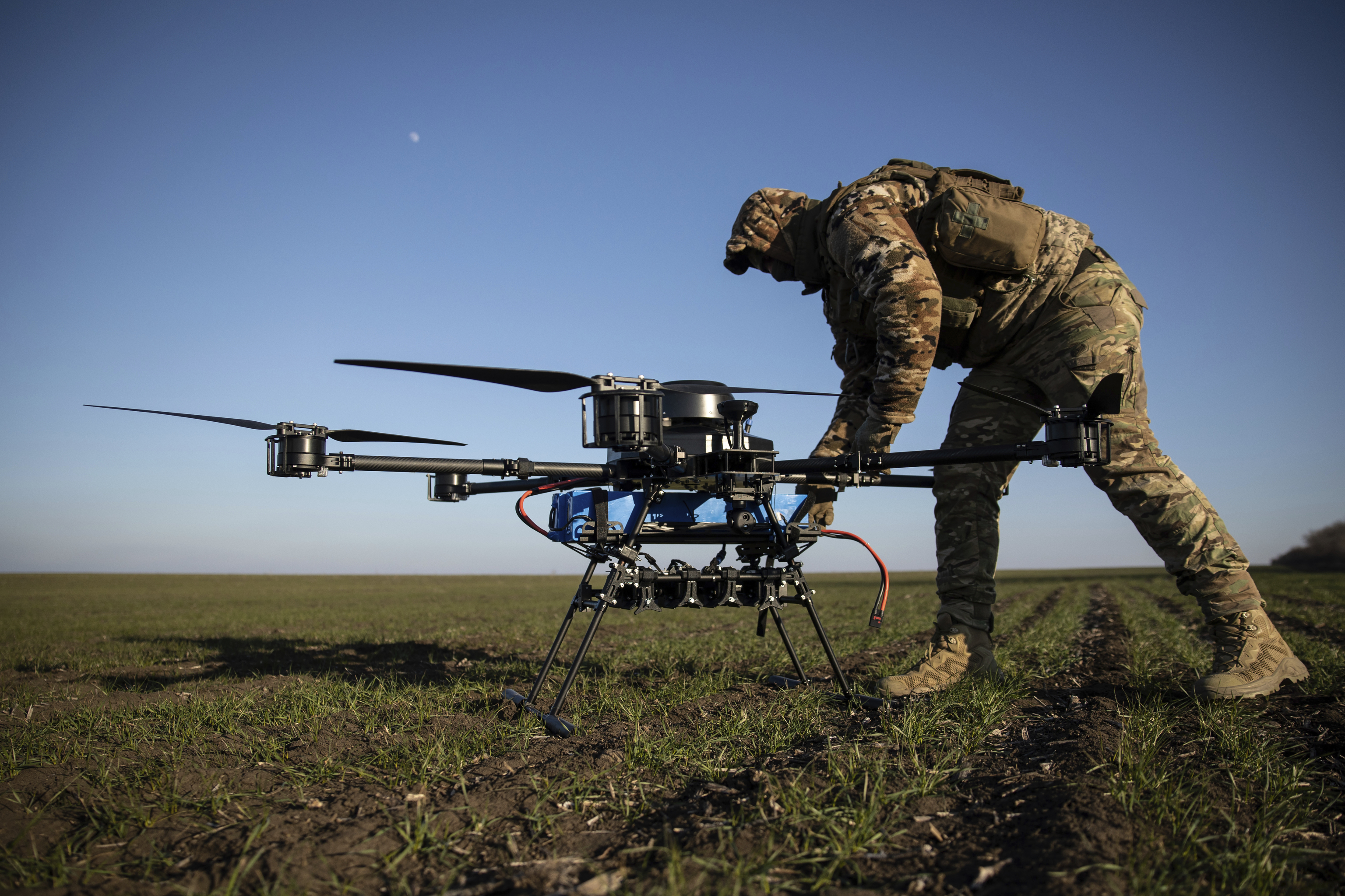 A Ukrainian serviceman prepares a Vampire attack drone near the front line in the Donetsk region.