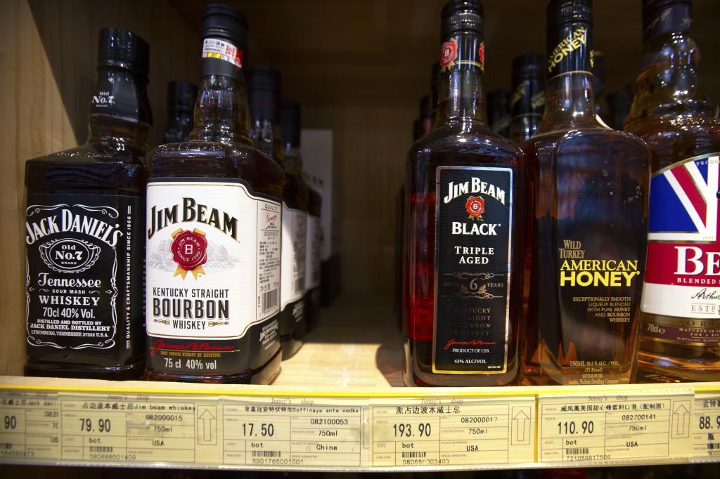 Whiskeys distilled and bottled in the U.S. are displayed for sale in a grocery store in Beijing