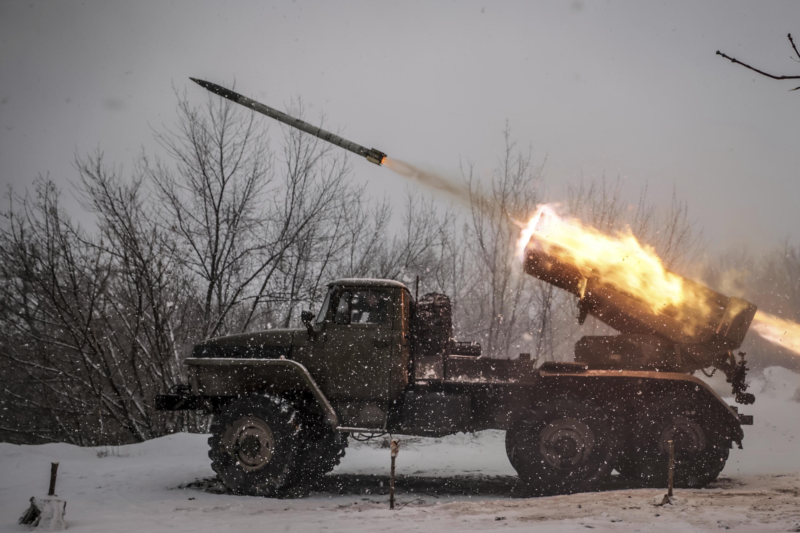 Ukrainian servicemen fire an MRLS BM-21 'Grad' towards Russian army positions.