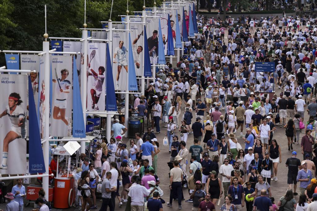 People walk through the USTA Billie Jean King National Tennis Center during the U.S. Open tennis championships