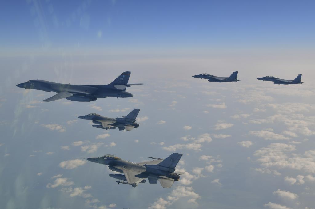 U.S. Air Force B-1B bomber, top center, F-16 fighter jets and South Korean Air Force F-15K fighter jets