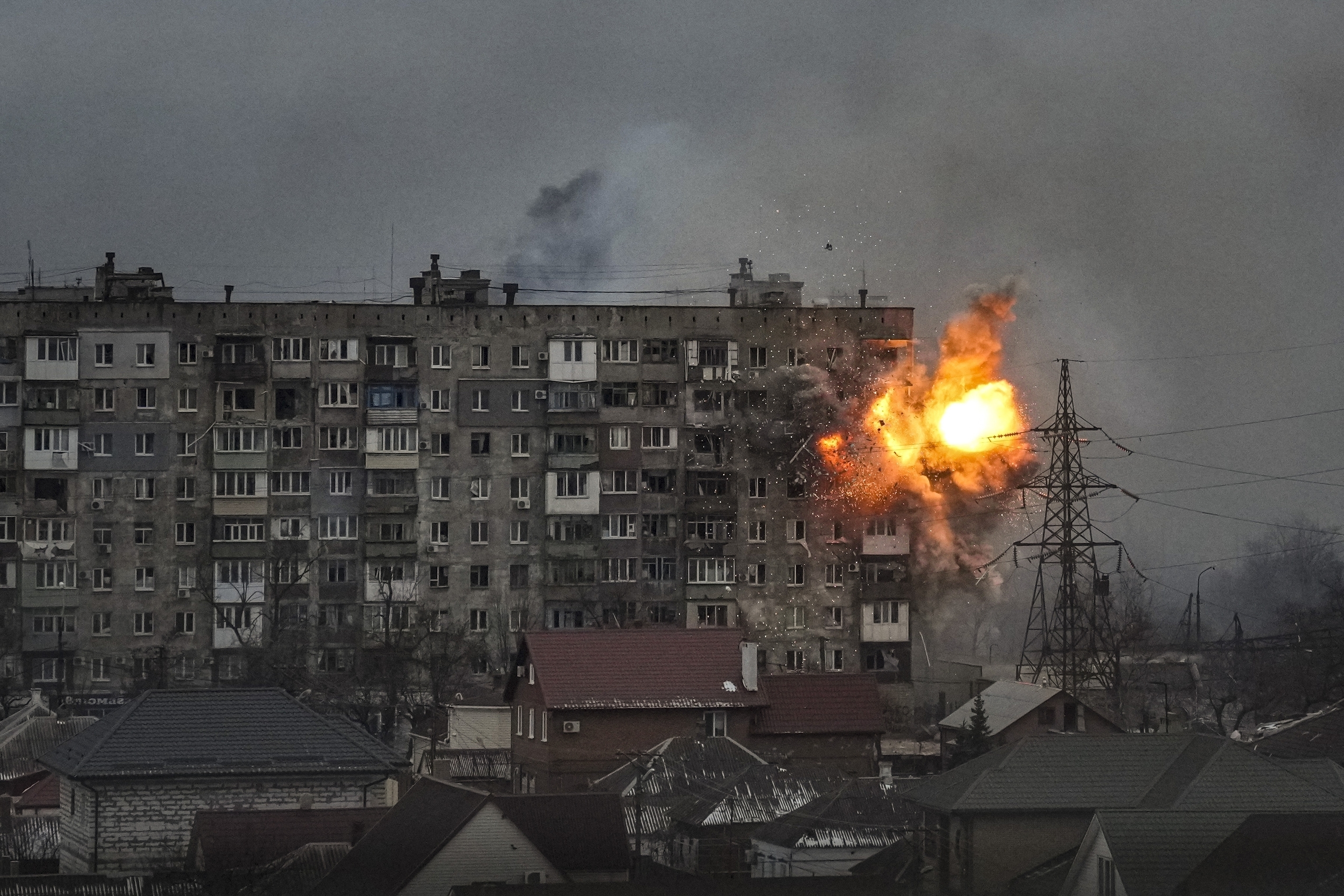 An explosion erupts from an apartment building at 110 Mytropolytska Street.