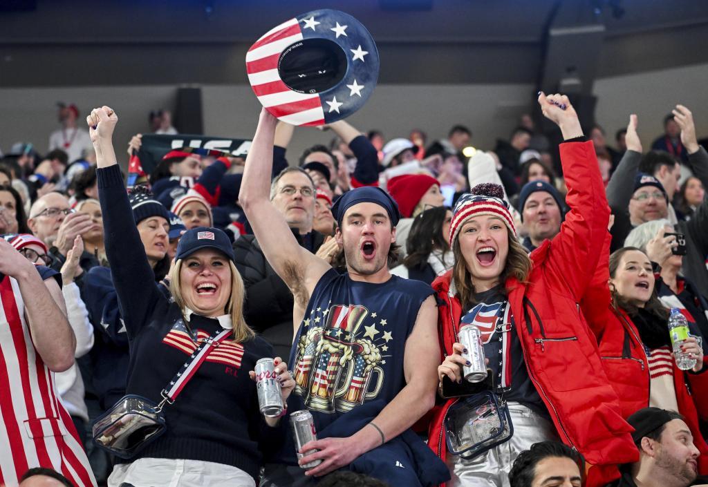 Team United States fans cheer after their team defeated Canada in a 4 Nations Face-Off hockey game in Montreal