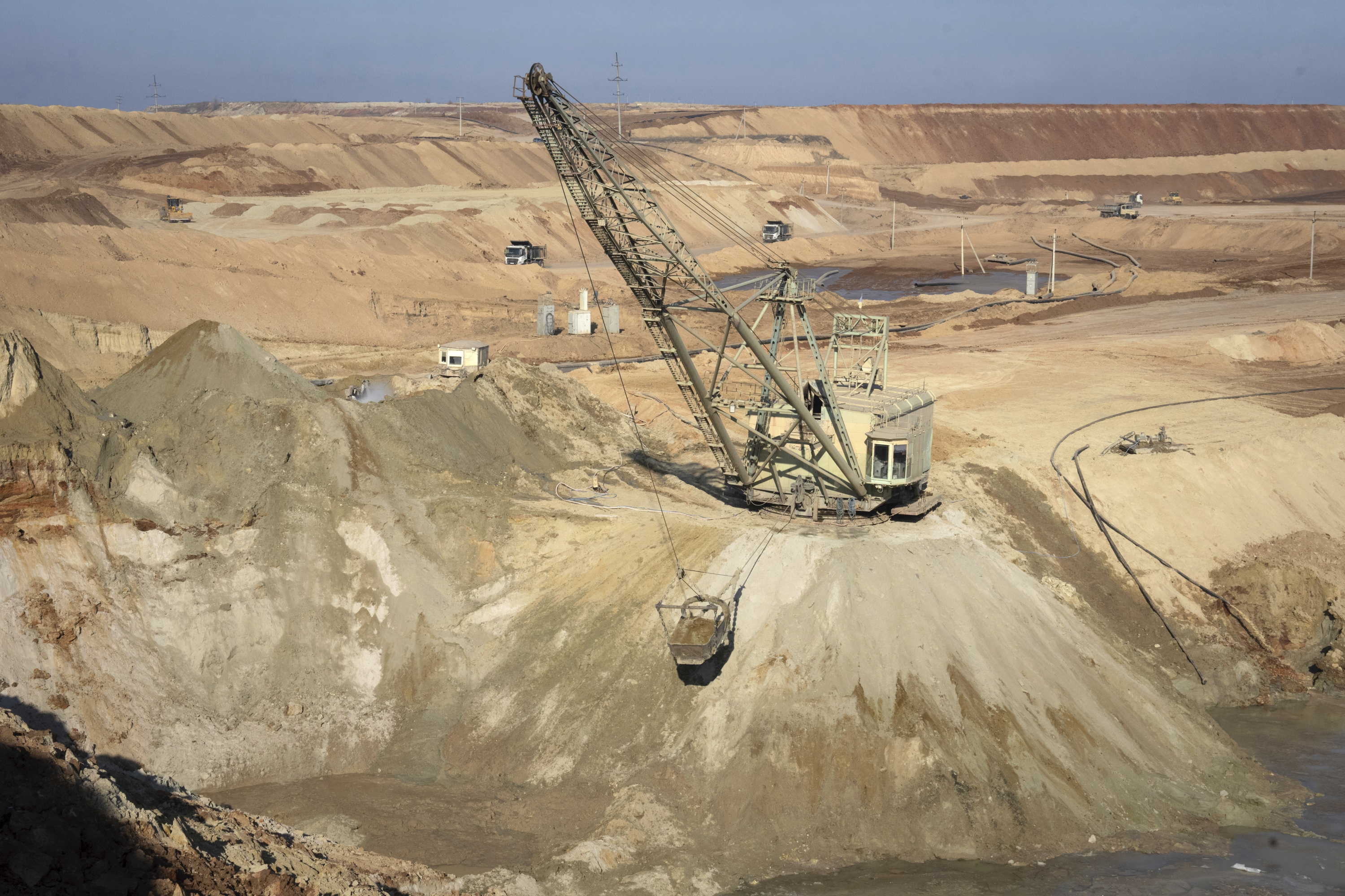 An aerial view of an ilmenite open pit mine in a canyon in the central region of Kirovohrad, Ukraine.