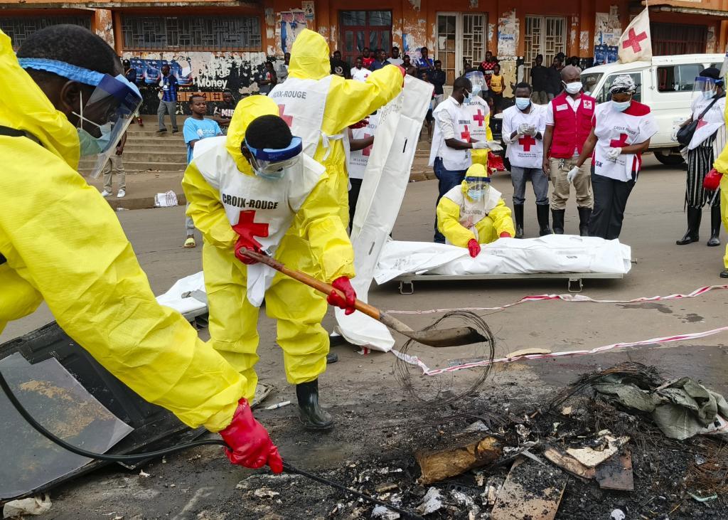 Red Cross workers clear the area in east Congo's second-largest city, Bukavu,