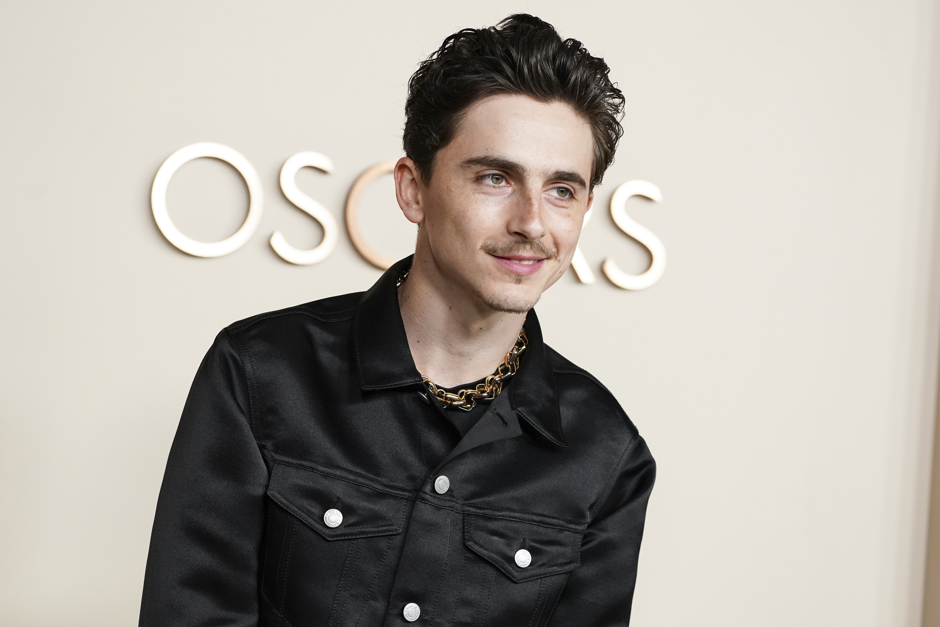 Timothee Chalamet arrives at the Oscars Nominees Dinner.