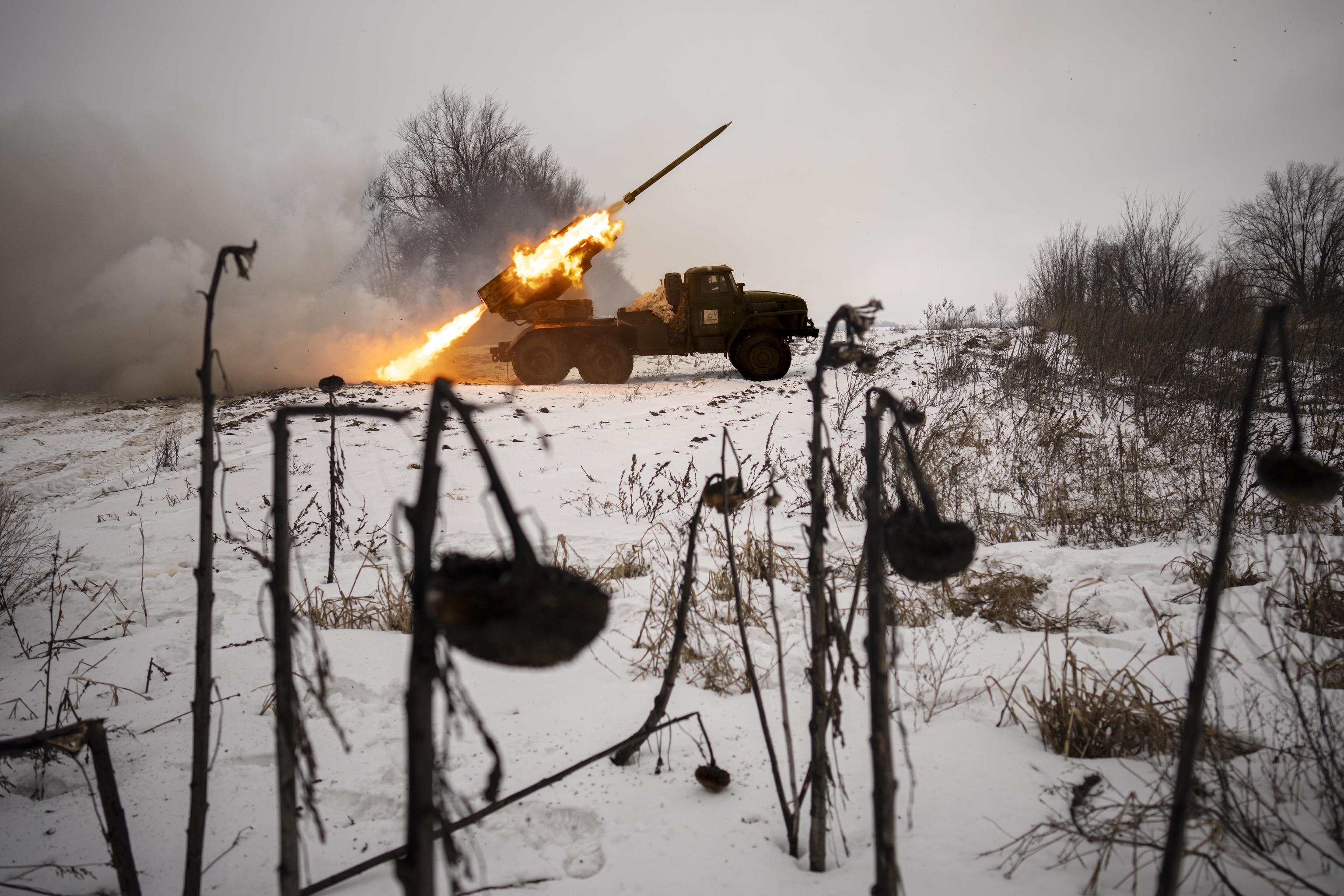 Ukrainian military fires from a multiple rocket launcher at Russian positions in the Kharkiv area.