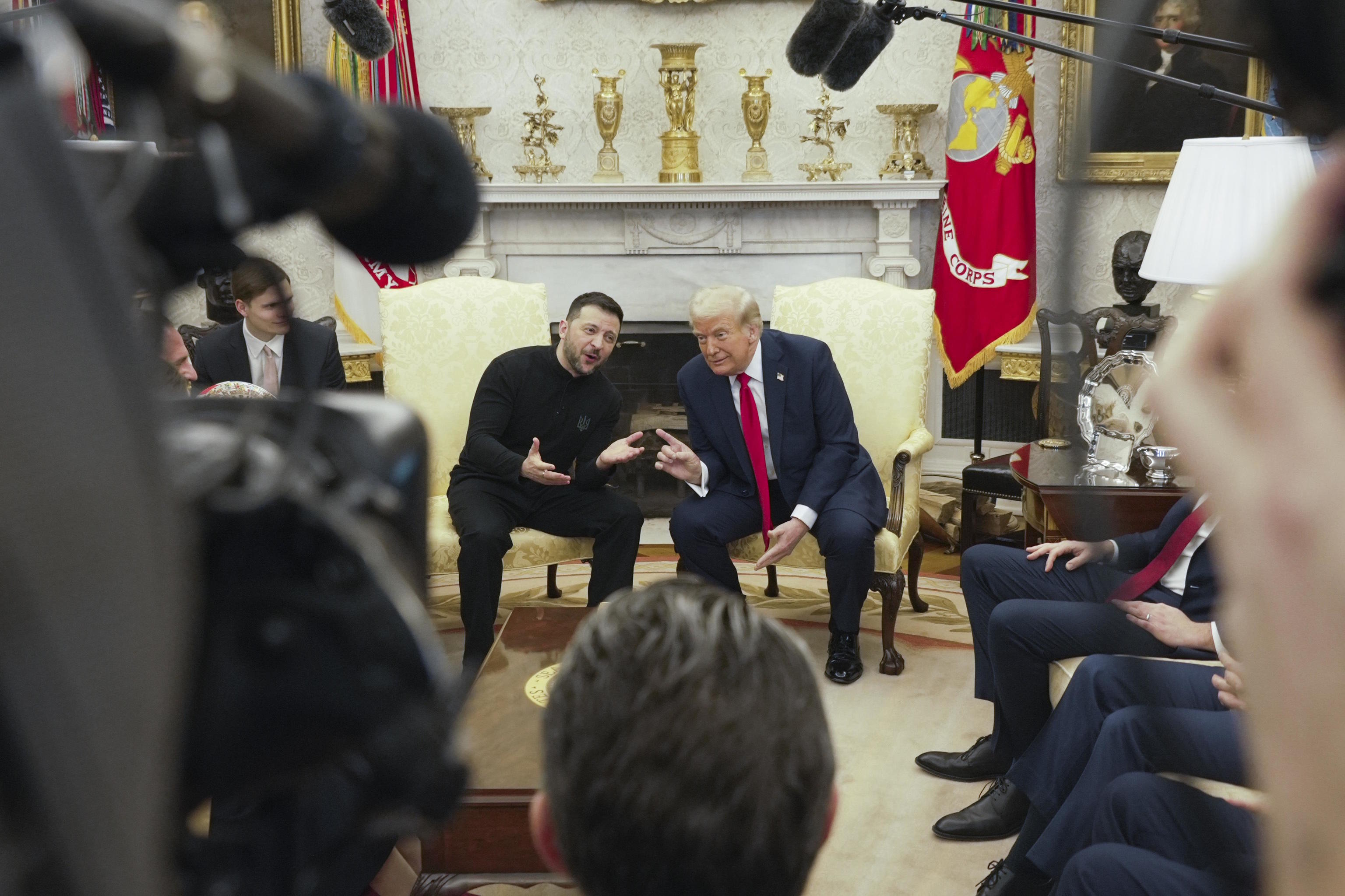 Trump, right, talks with Ukrainian President Zelenskyy in the Oval Office.