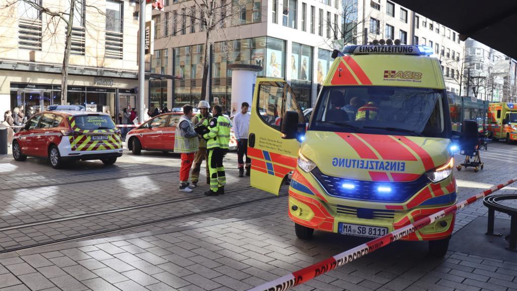 Emergency services and police stand at Paradeplatz in Mannheim, Germany
