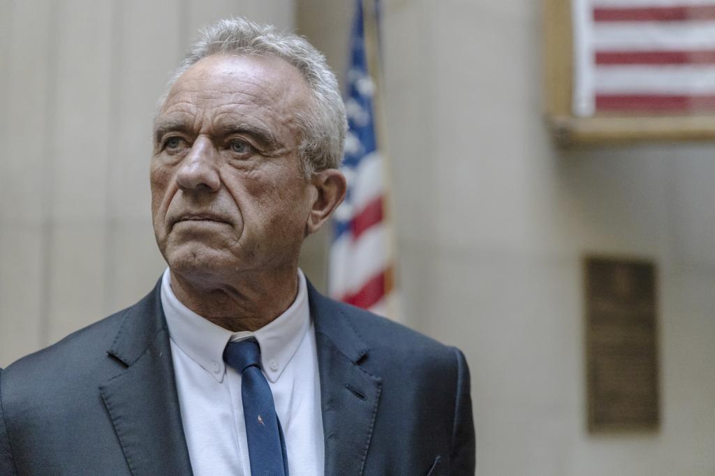 Robert F. Kennedy Jr. speaks to reporters at the Nassau County Supreme Court