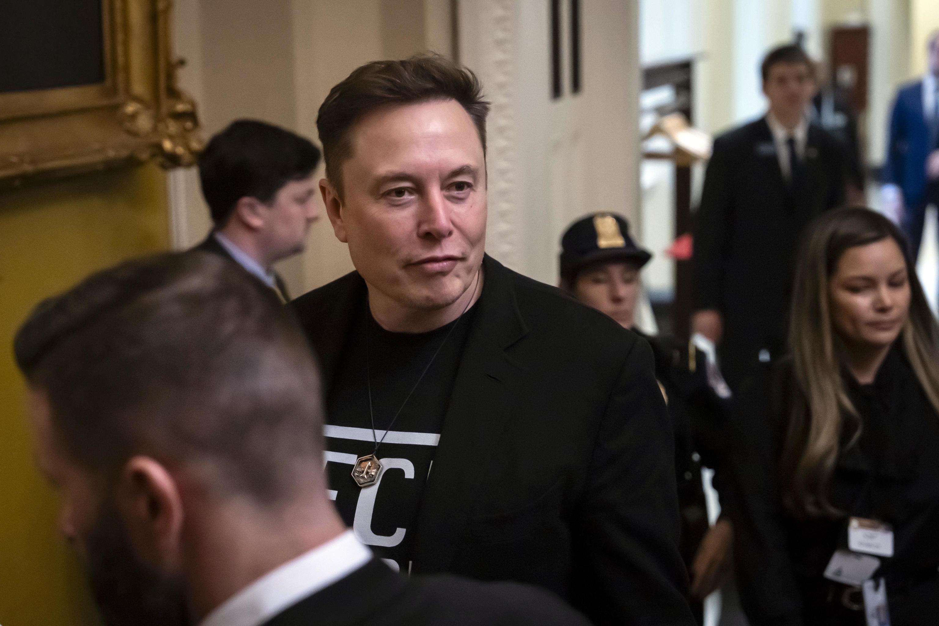 Elon Musk departs the Capitol following a meeting with Senate Republicans.