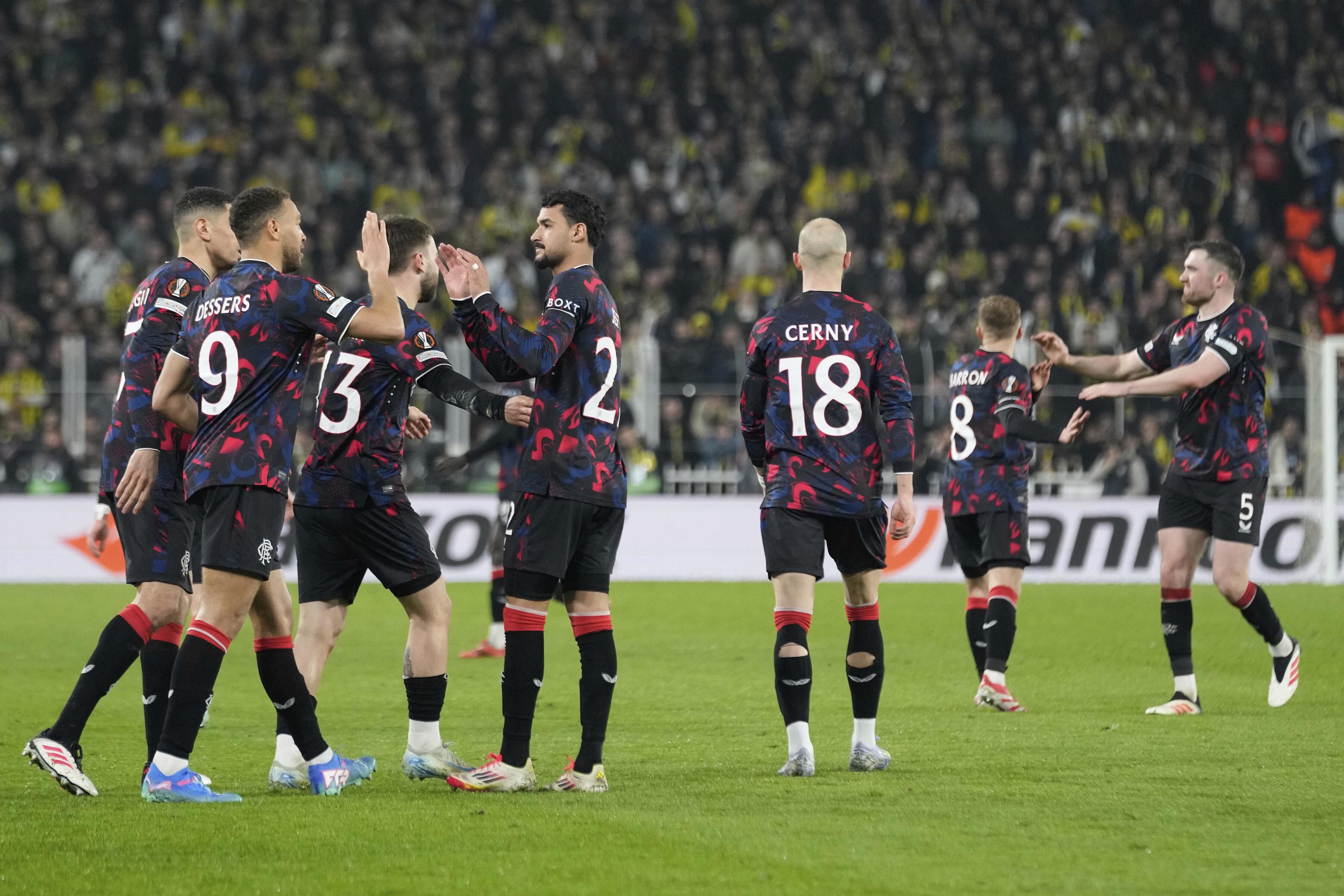 Rangers' Cyriel Dessers, celebrates with bis teammates during the Europa League.