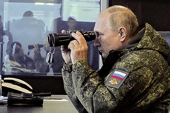 Vladimir Putin observes a military exercise in Vladivostok, in 2022.