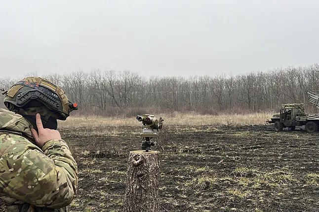 A Russian self-propelled multiple rocket launcher 'Grad' prepared to fire at Ukrainian positions.