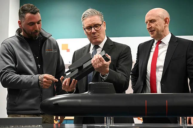 Starmer with John Healey during his visit to the Vanguard submarine.