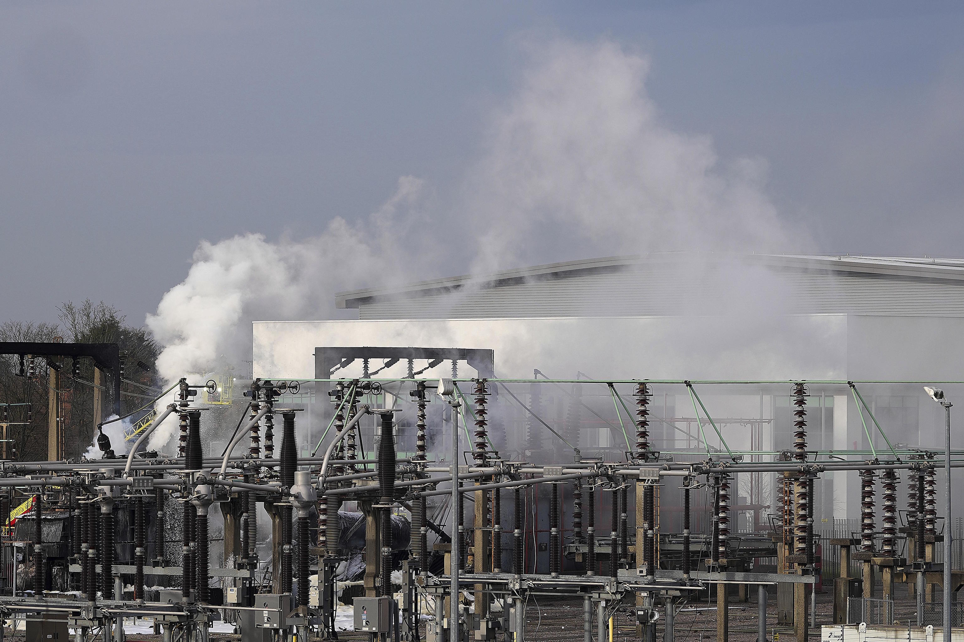 Firefighters extinguish the fire at the North Hyde electrical substation.