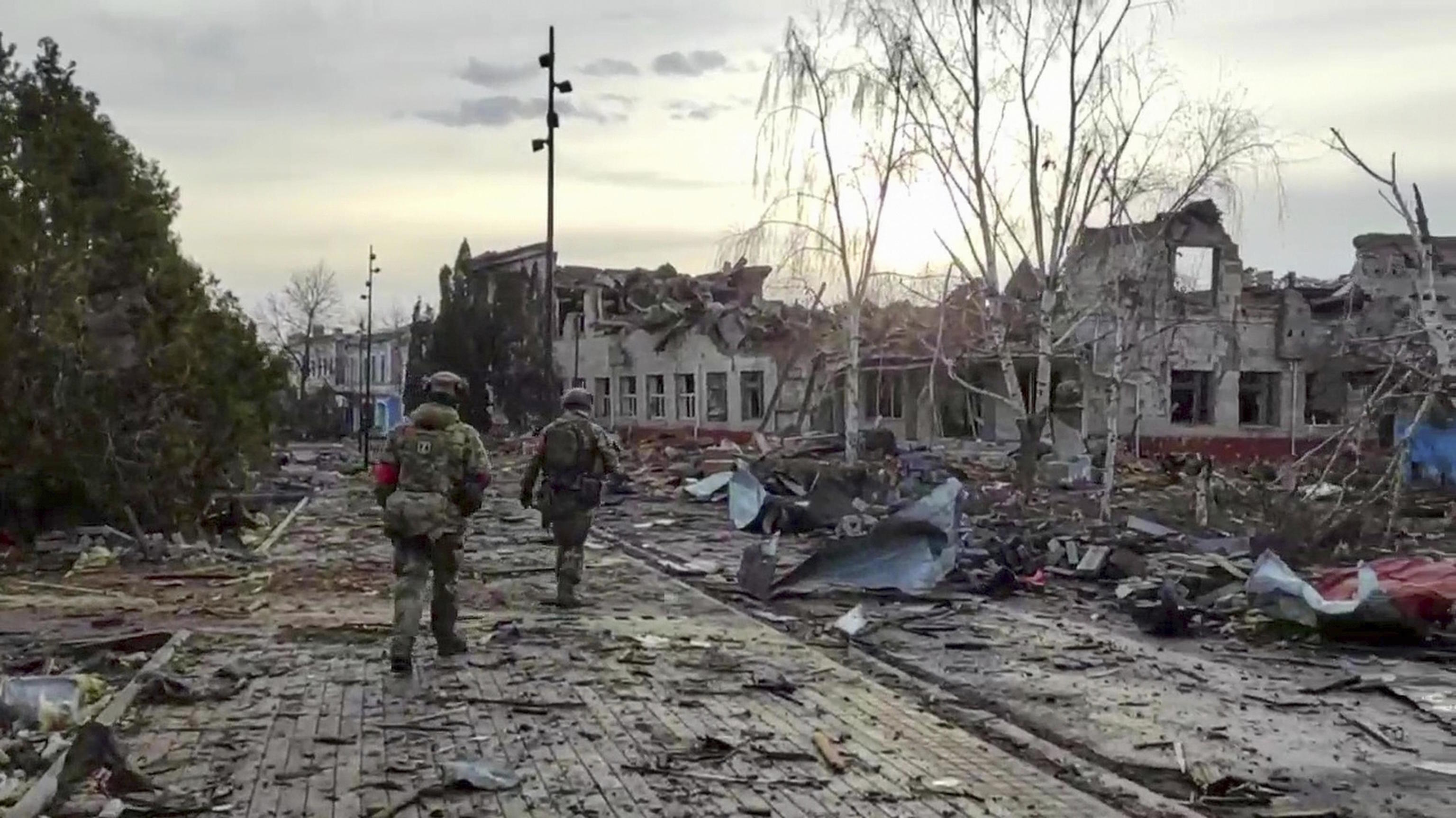 Russian soldiers patrol an area in Sudzha, in the Kursk region.