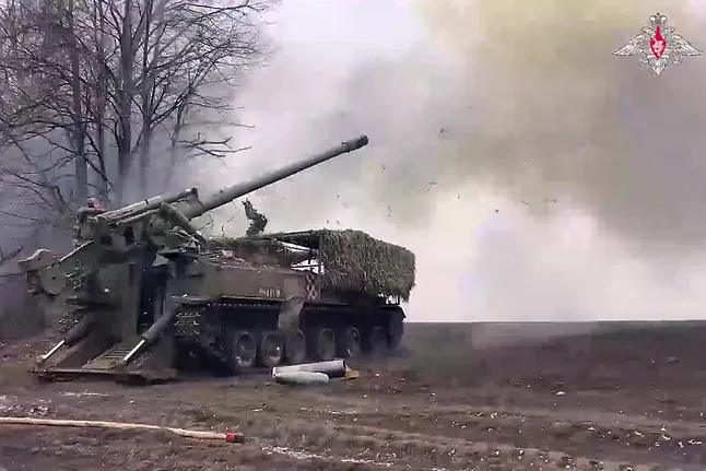A Russian armored vehicle fires a missile in an unknown demarcation of the front.
